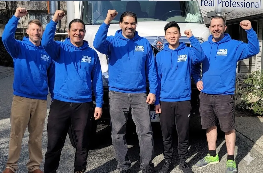 The 1Pro Moving crew with their truck in Metro Vancouver