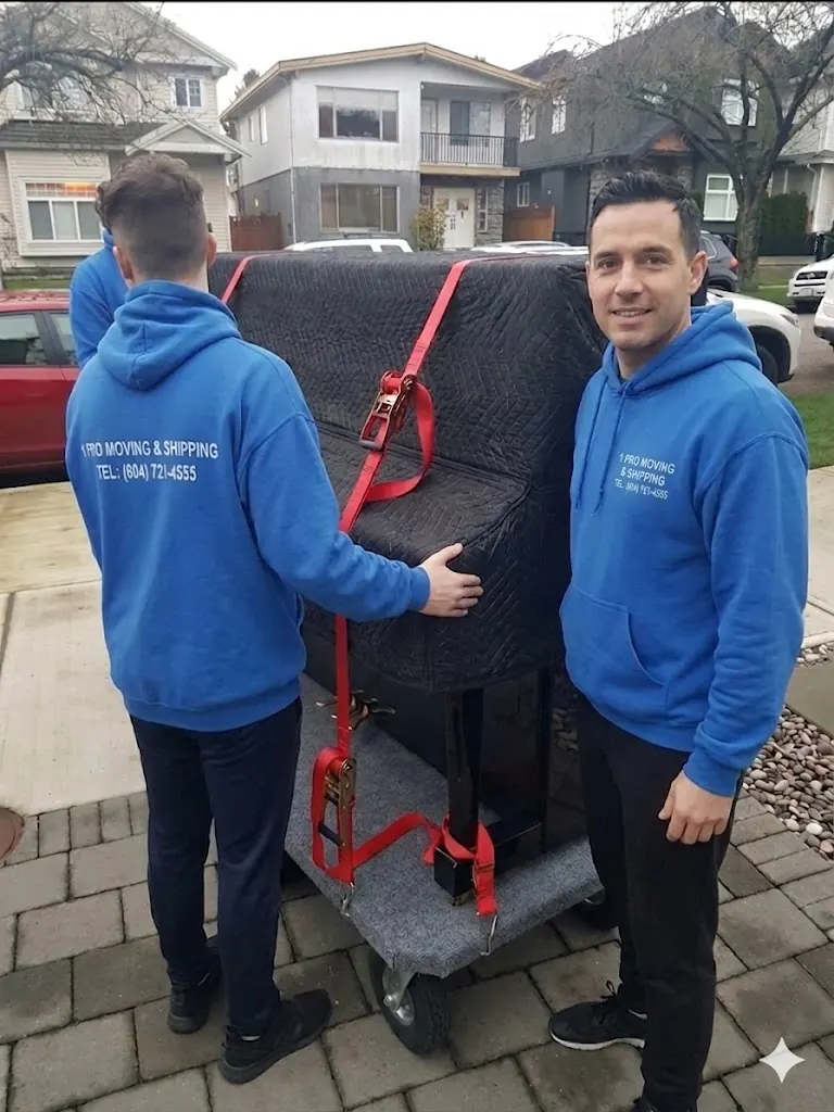 1Pro piano moving crew handling an upright piano